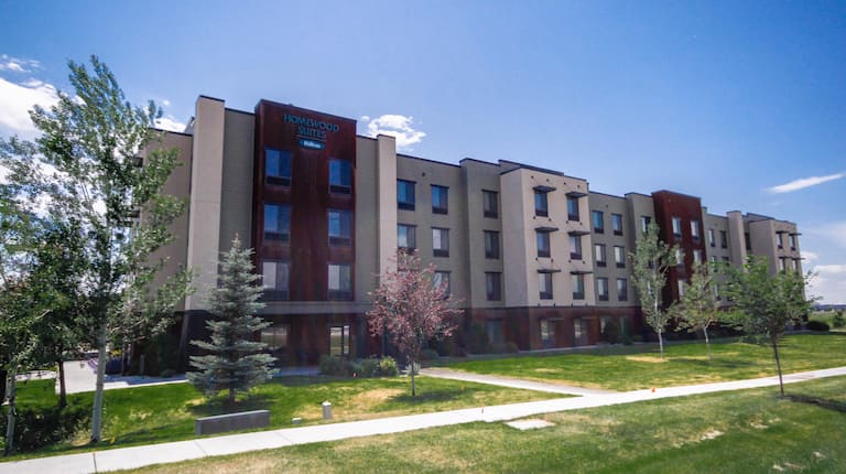 Hotel Exterior and Trees on a Sunny Day