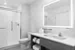 Spacious suite bathroom with a stunning glass shower