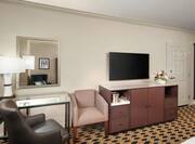 Room Amenities such as HDTV Soft Chair and Desk Area