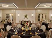 Hilton Ballroom with Round Tables and Chairs