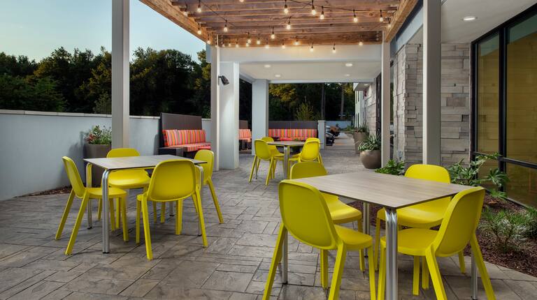 Outdooer seating area with tables and chairs