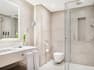 Premier Bathroom with Roll In Shower and Amenities