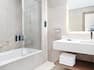 Premier Bathroom with Tub and Amenities