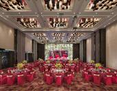 Grand Ballroom with Round Tables and Chairs