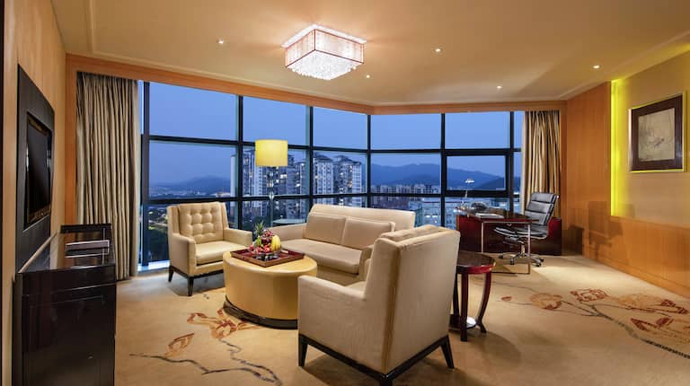 Suite Living Room with Large Windows Offering City Views