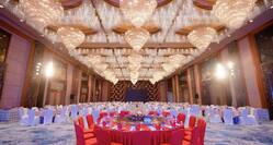Overview of Elegant Jade Ballroom Set up with Round Tables