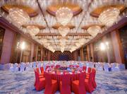 Overview of Elegant Jade Ballroom Set up with Round Tables