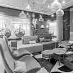 Lobby seating area with chairs and sofa