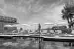 Outdoor pool with woman walking by