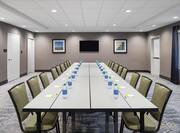 Conference Table with Chairs in Meeting Room 