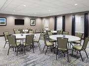 Chairs and Round Tables in Meeting Room 