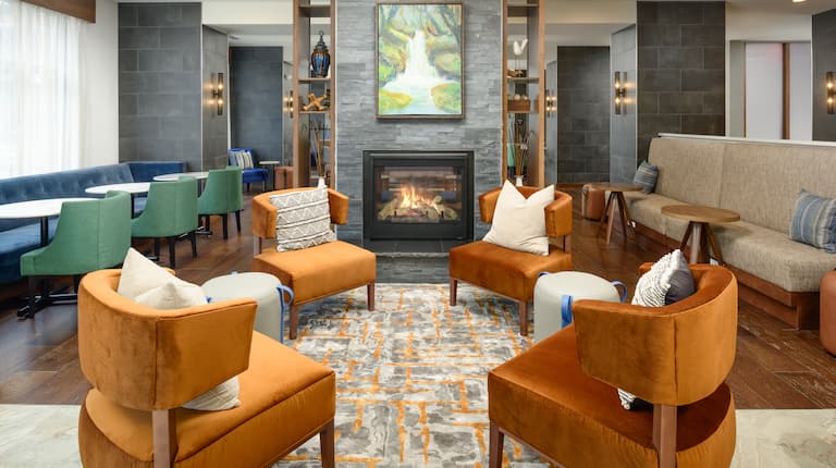 Lobby Seating Area with Sofa and Fireplace