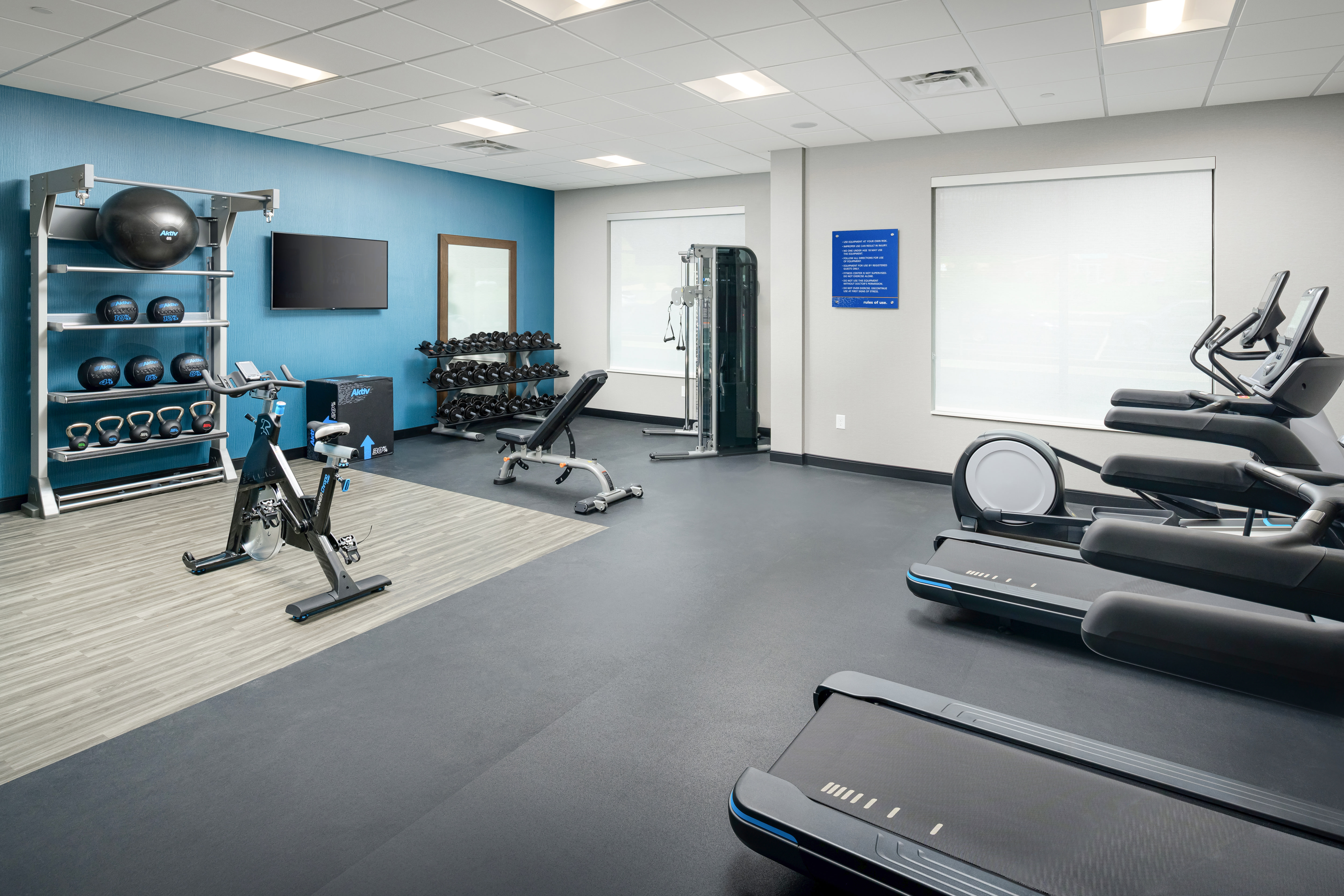 Treadmills Weights and HDTV in Fitness Center