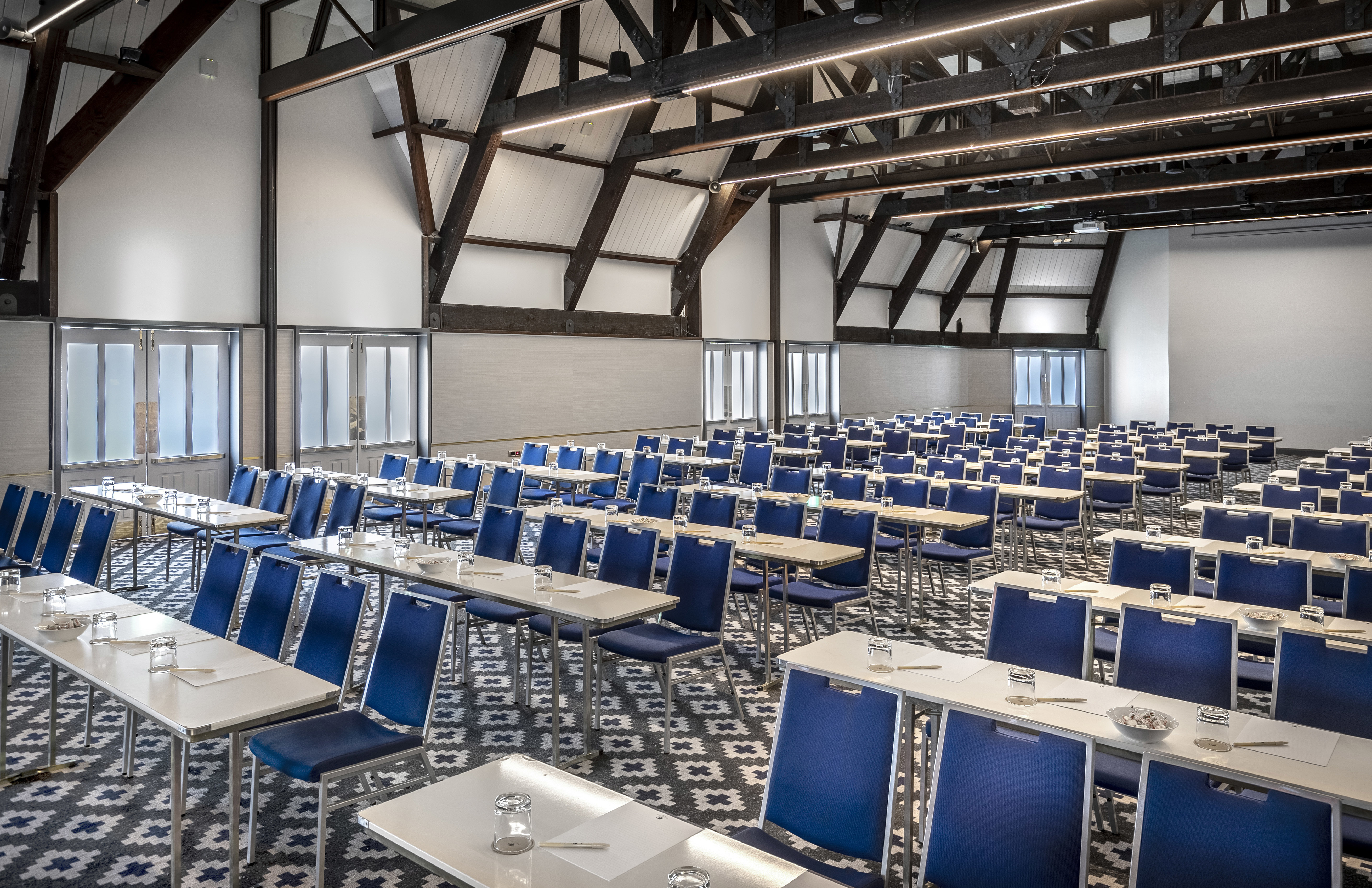 classroom tables in a large meeting room