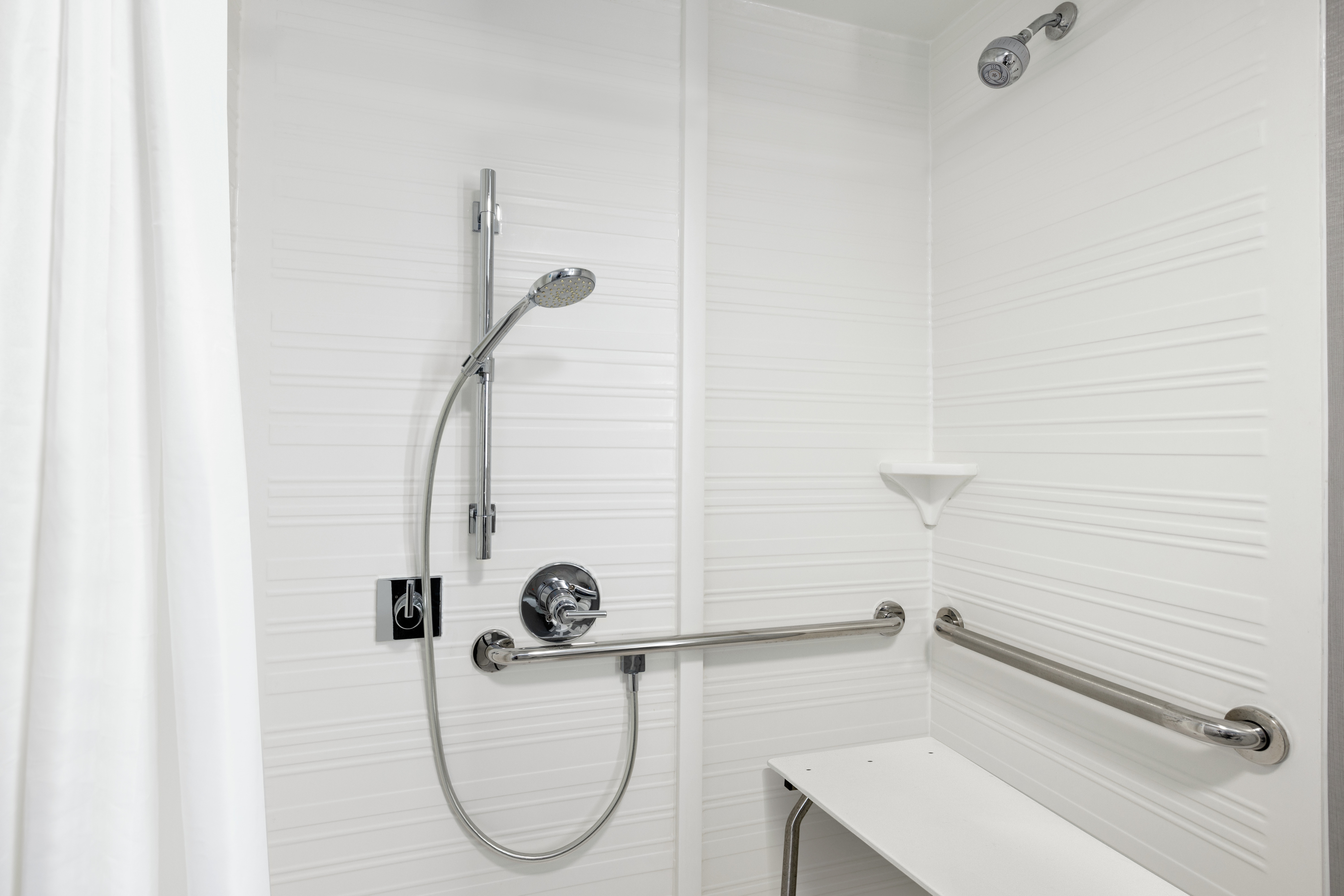 A view of the highly assistive roll-in shower.