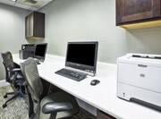 Business center with computers and printers