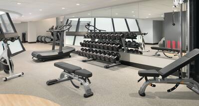 Fitness center with weights and bench