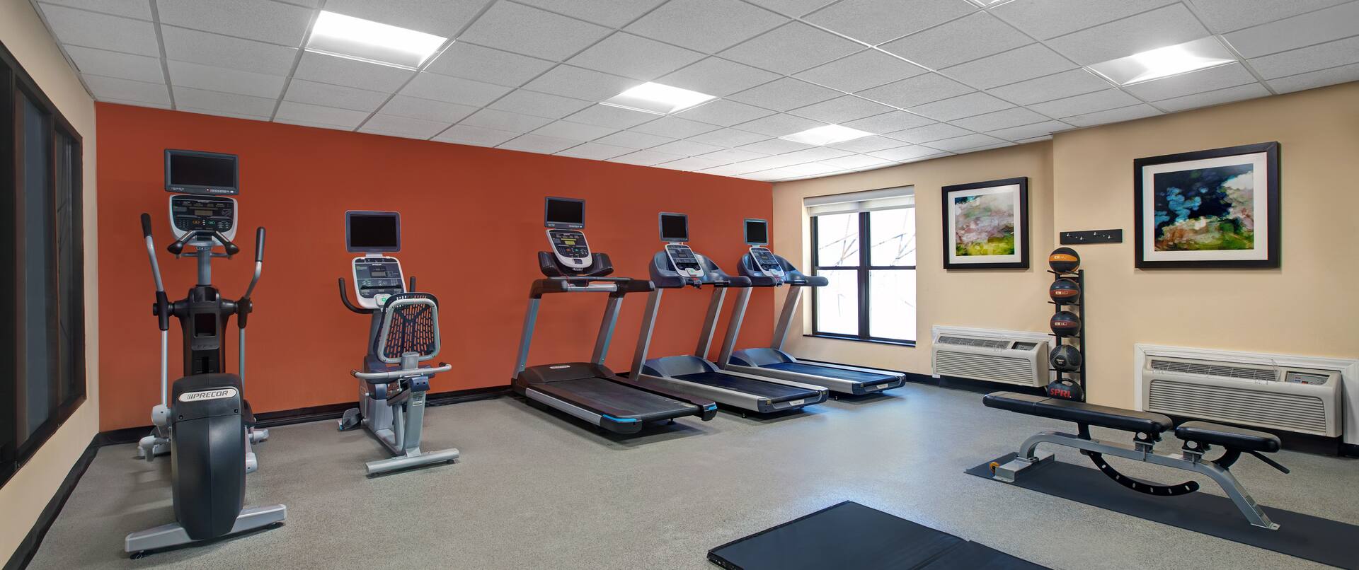 fitness center with various workout machines