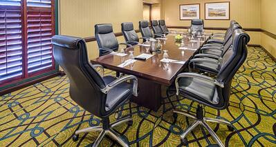 Boardroom West Meeting Space with long table a chairs