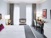 Grand Deluxe Room with king bed and work desk