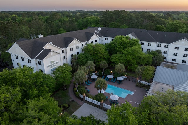 Hotel Exterior at sunset set in woods