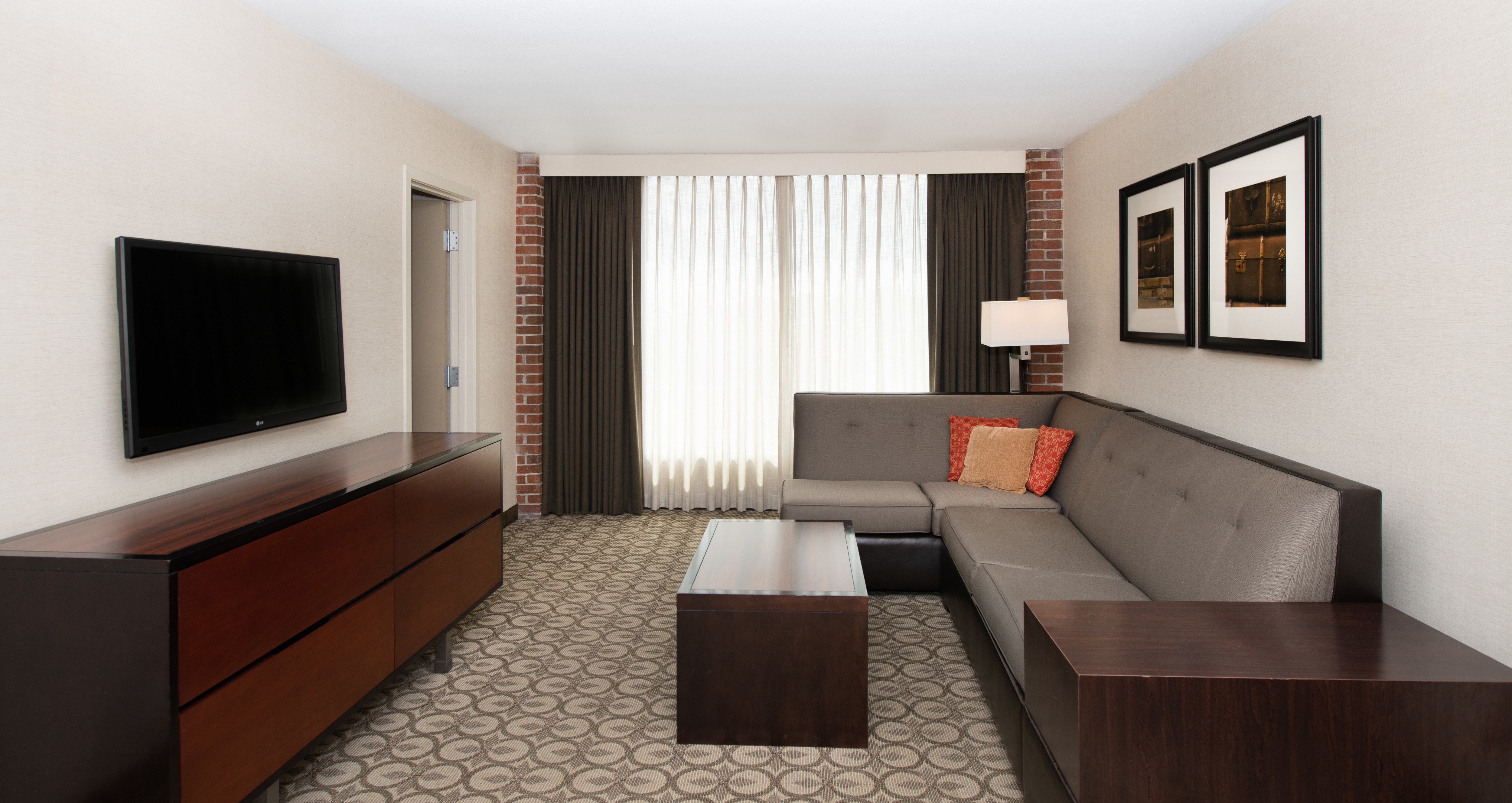 Suite Living Area with Seating and Flat Screen TV