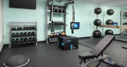 Fitness center with weights and bench