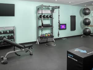 Fitness Center with a Variety of Workout Equipment 
