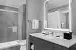 Bathroom with sink and mirror