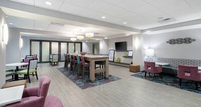 Lobby Area with Large Table and HDTV