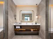 Family suite bathroom vanity and tub