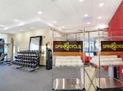 Spin2Cycle Fitness Center with Workout Equipment and Amenities 