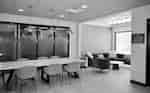 Community table in the lobby and a corner sitting area.