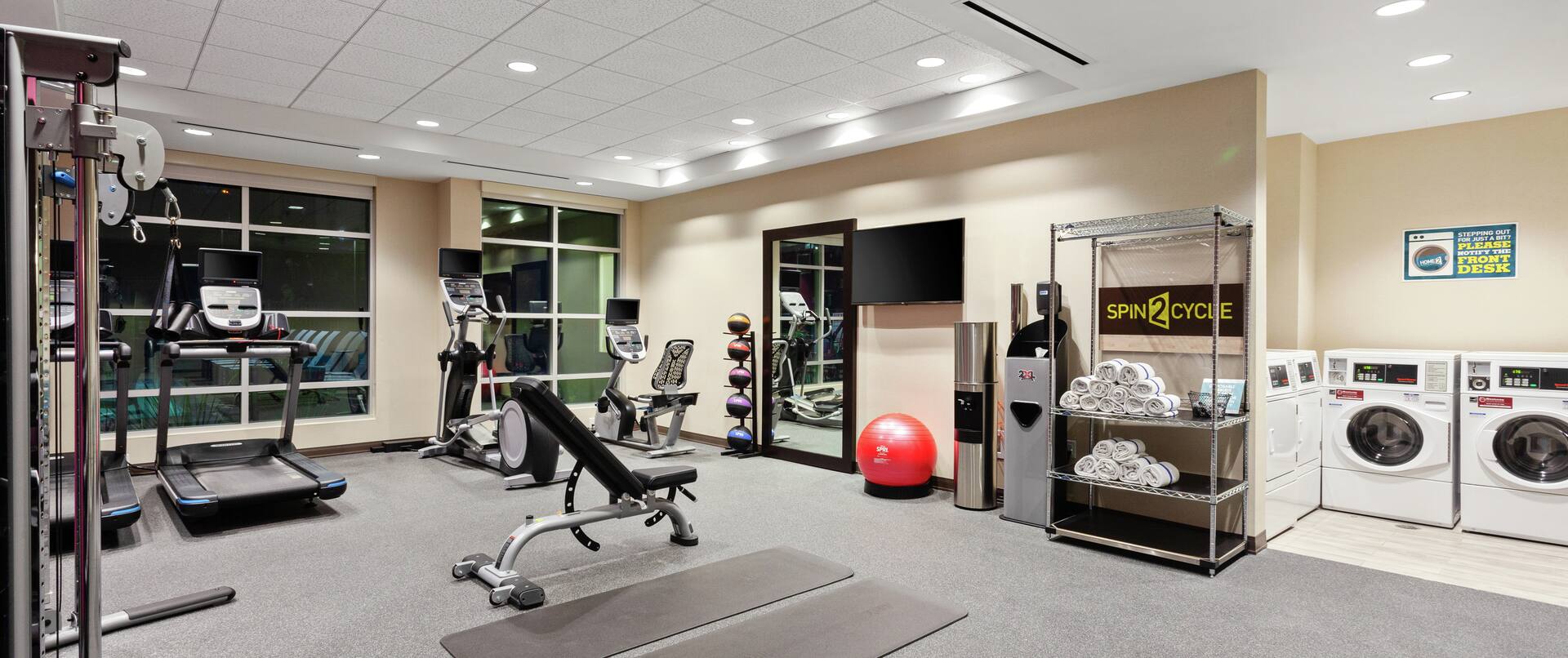 Fitness Center with Weight Bench, Treadmill and Weight Machine