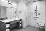 Kamar Mandi Ramah Penyandang Disabilitas dengan roll-in shower 