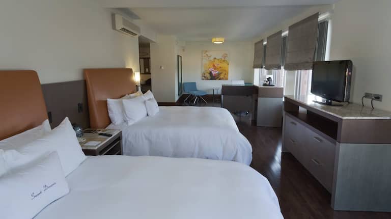 Two Queen Beds and HDTV in Guest Suite