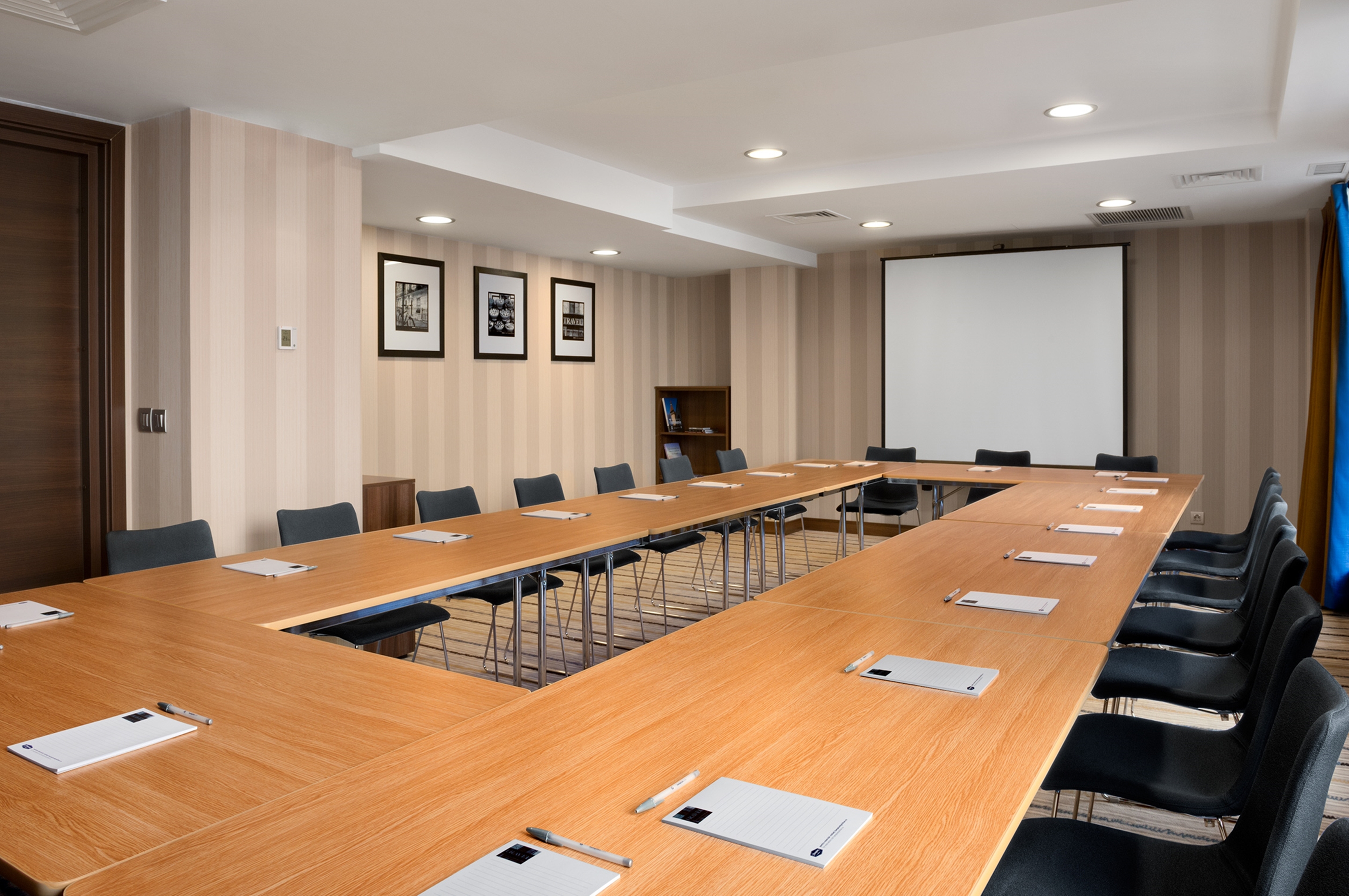 Meeting Room Setup Hollow Square Style and a Projection Screen