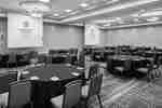 Carolina Meeting Room With Round Tables and Projector Screens