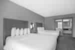 Suite mit zwei Queensize-Betten – Zimmer 
