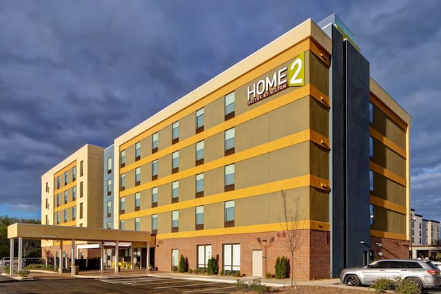 front exterior of hotel at dusk