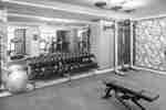 Fitness center with weightbench and free weights