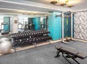 Fitness center with weightbench and free weights
