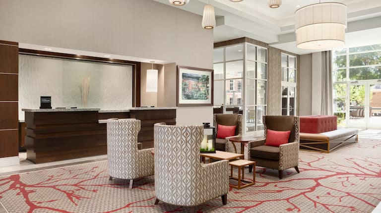 Lobby Seating Front Desk Reception Area with Armchairs, Coffee Table and Circle Sofa
