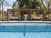 Outdoor Swimming Pool with Two Sofas and Armchairs