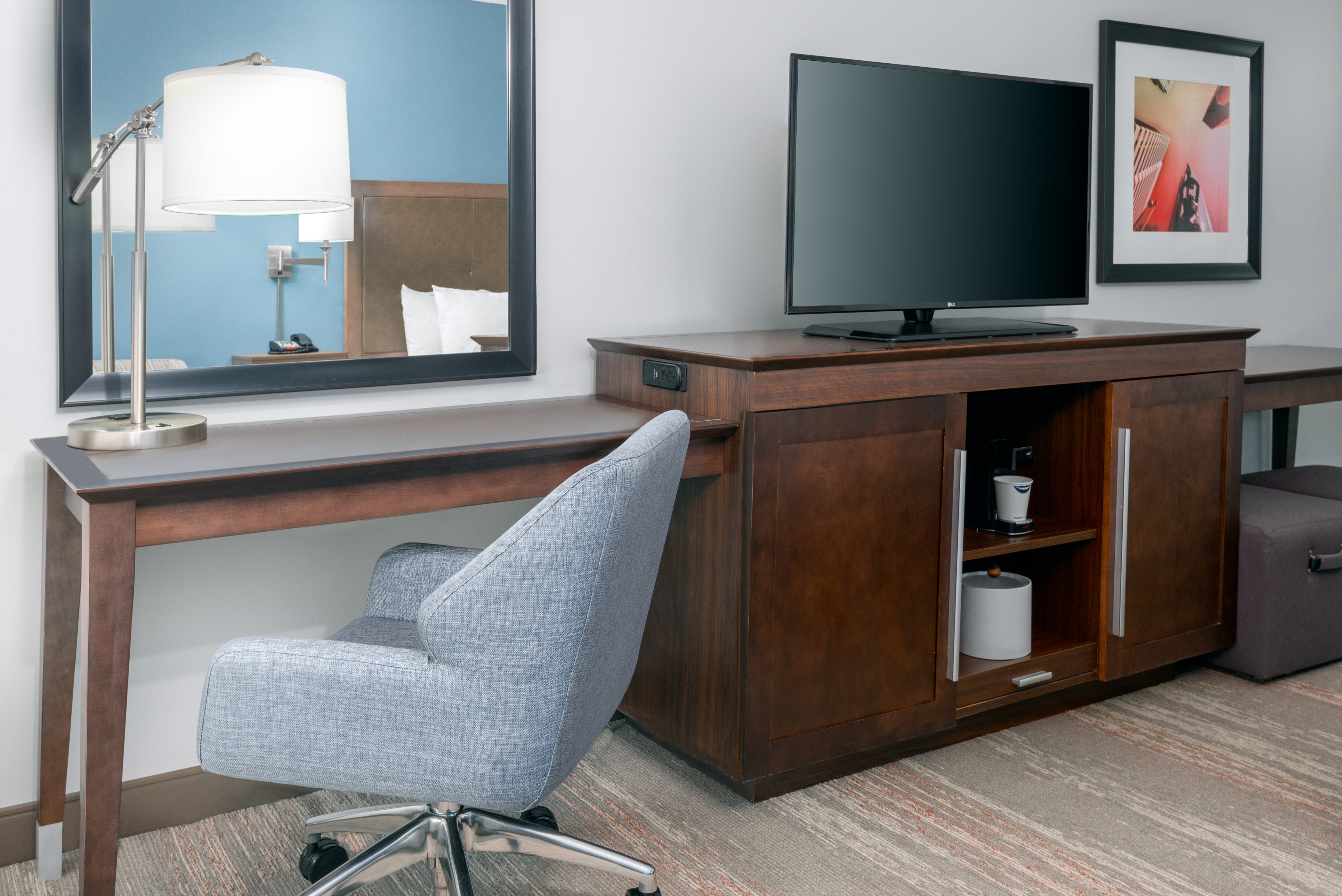 work desk and TV in guestroom