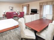 Murphy Bed, Lounge Seating, and Dining Area in Murphy Mobility/Hearing Accessible Guest Room