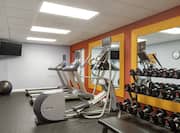 Convenient on-site fitness center fully equipped with free weights, cardio machines, and TV.