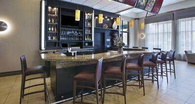  View of TV and Counter Seating at Full Lobby Bar