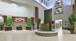 Reception Area and Fountain in  Lobby Entrance