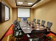 Meeting Room with Table, Office Chairs and Projector Screen